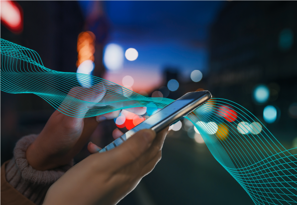 woman holding a cell phone in her hand with wavy aqua lines going through it representing the flow of data